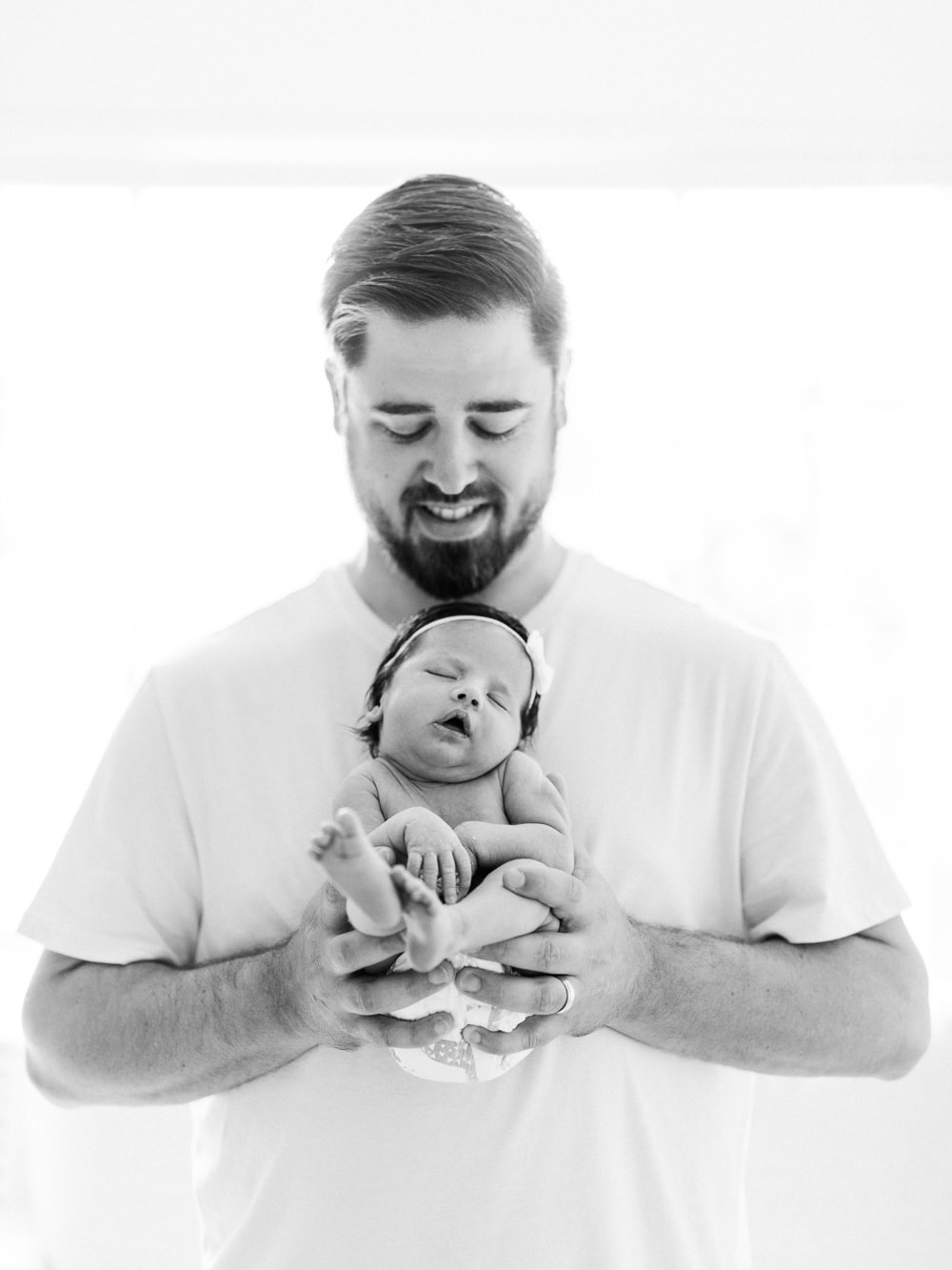 Newborn with dad, Cleveland Newborn Photography, In-home newborn photography photo inspiration by Juliana Kaderbek Photography