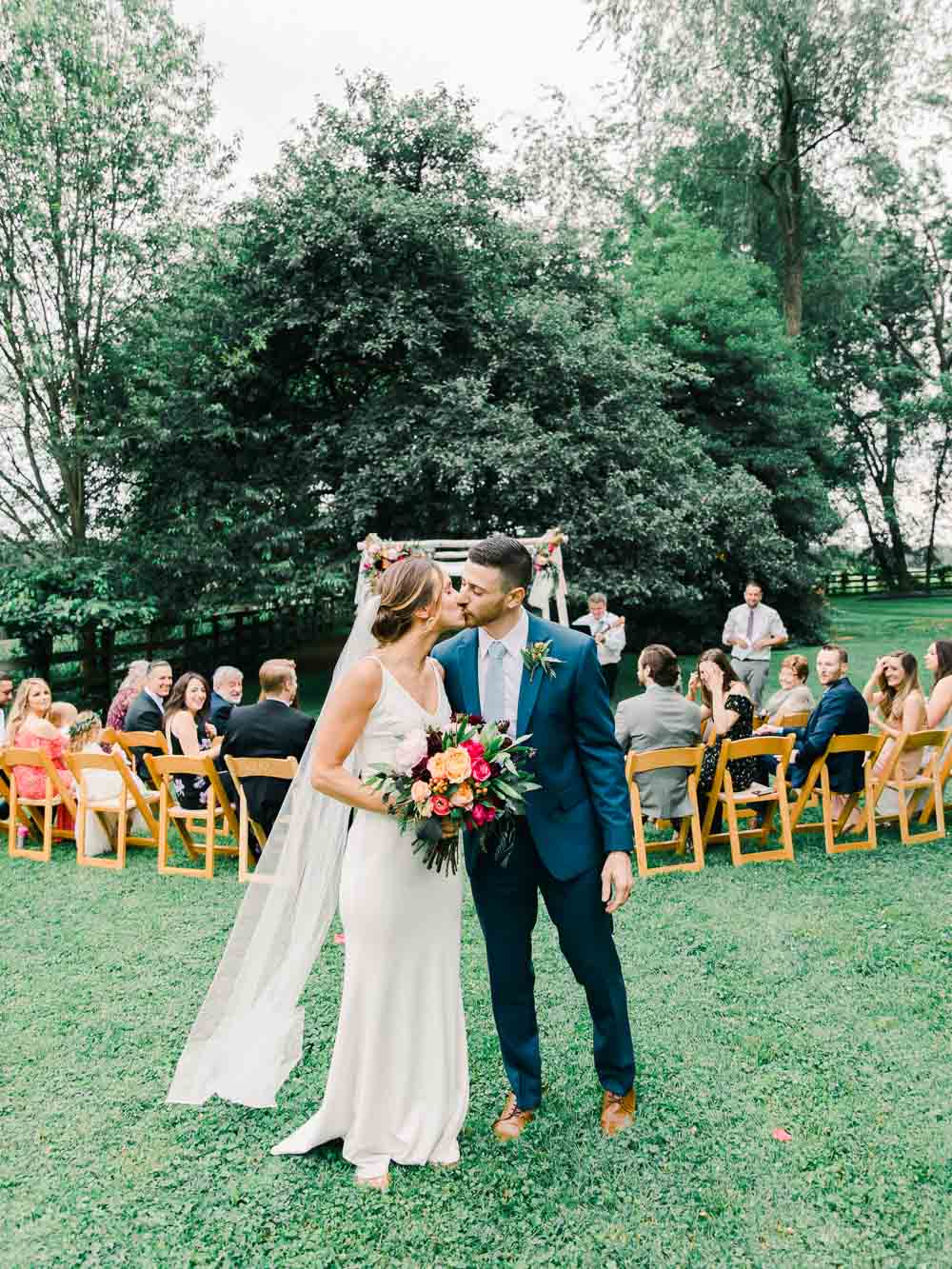bride and groom kissing, Cleveland outdoor wedding, Cleveland wedding photography, juliana kaderbek photography