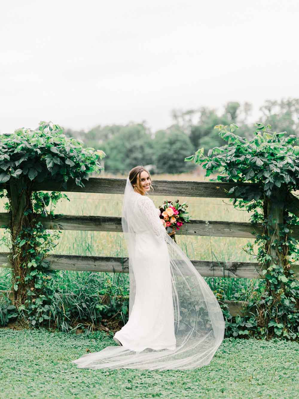 bride holding flowers during her intimate backyard wedding in cleveland Ohio
