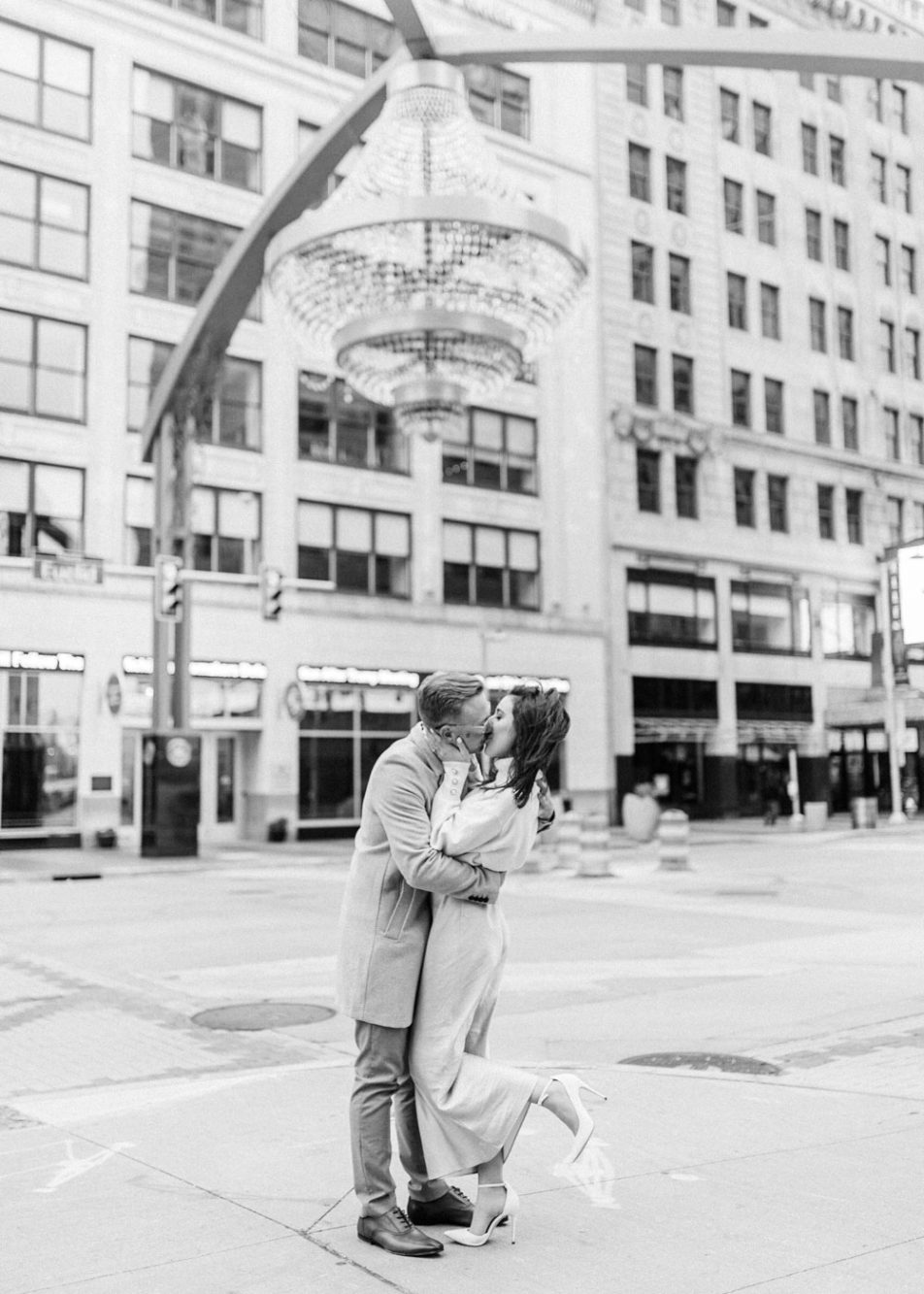 engagement photos by the ge chandelier in Cleveland ohio
