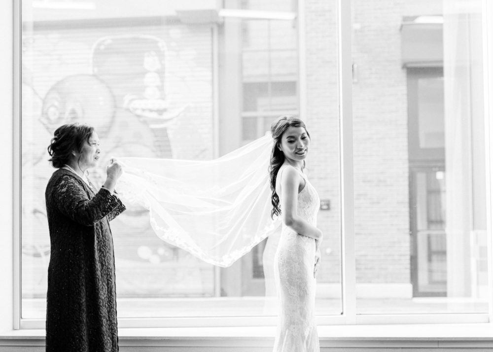 Bride getting ready photographed by Juliana Kaderbek Photography: Cleveland wedding photographer