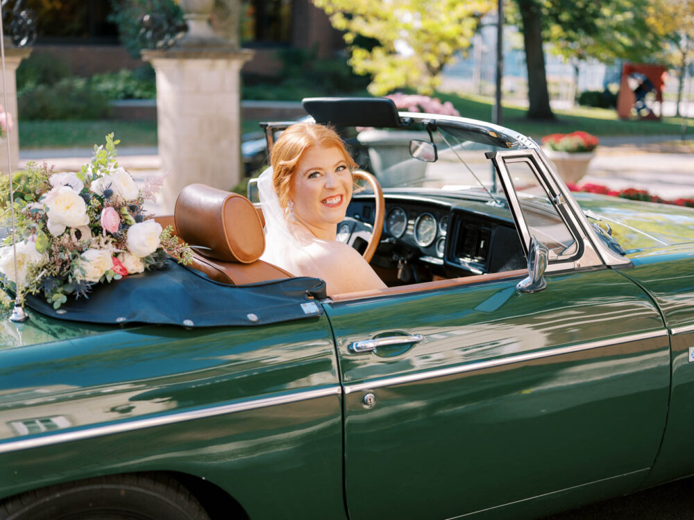 Bride in a vintage car