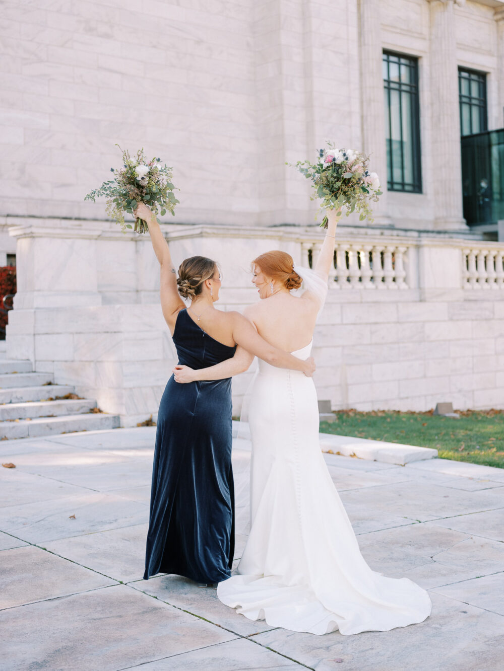 Bride with her bridesmaid during portraits at Cleveland Art Museum 