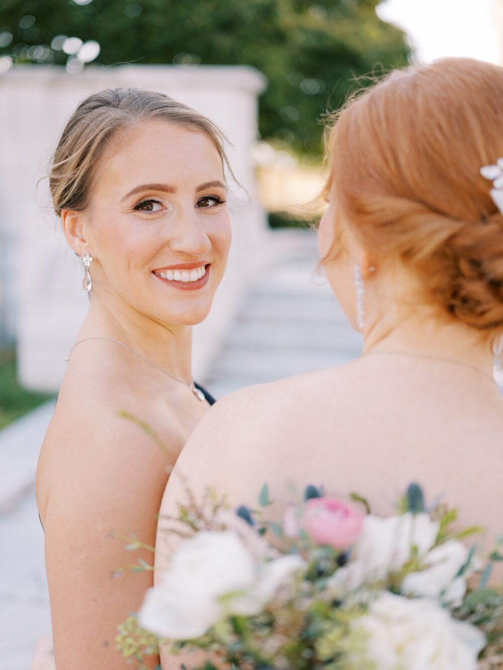 Bride with her bridesmaid during portraits at Cleveland Art Museum 