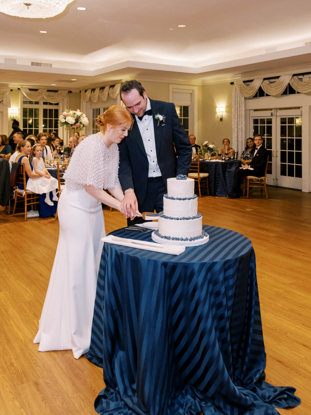 Bride and groom cake cutting at Glidden House