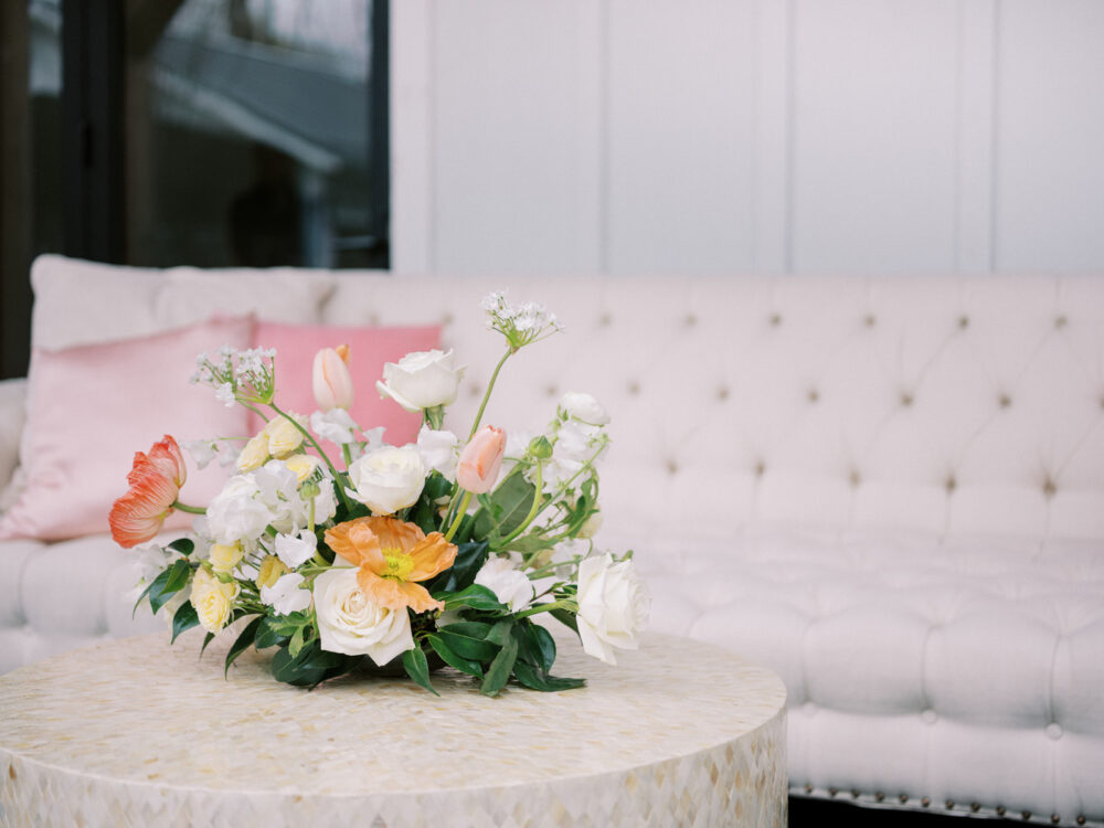 Lounge seating setup with soft romantic florals for a timeless Orlando wedding photographed by Juliana Kae