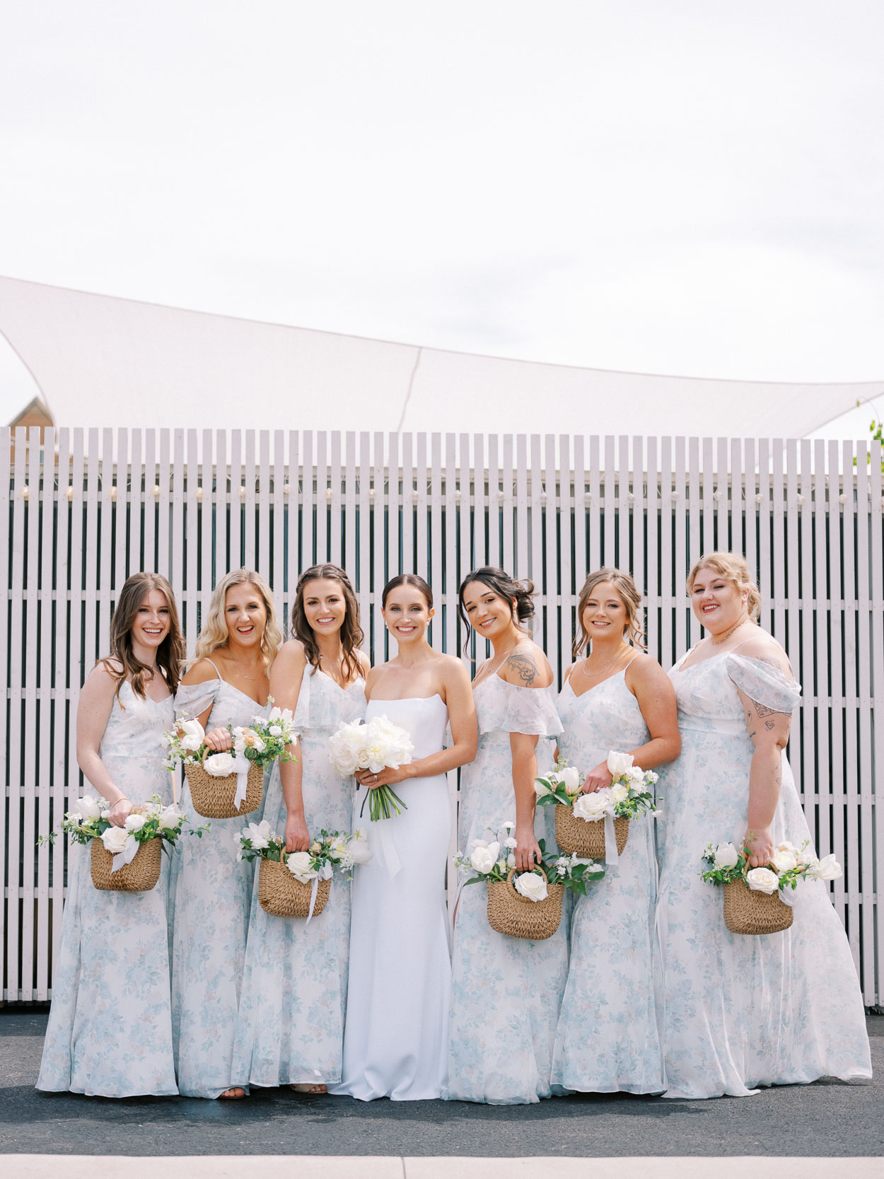 Bridesmaids with floral baskets at Gordon Green wedding