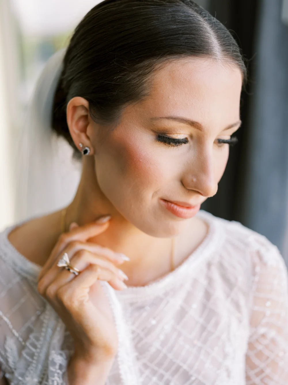 Portrait of bride wearing J. Andreatta gown as she gets ready for her Cleveland wedding