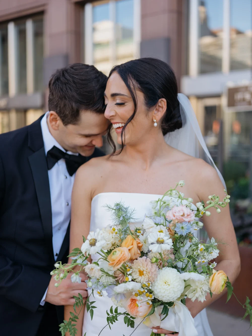Bride and groom laughing during their dream wedding in Columbia, SC