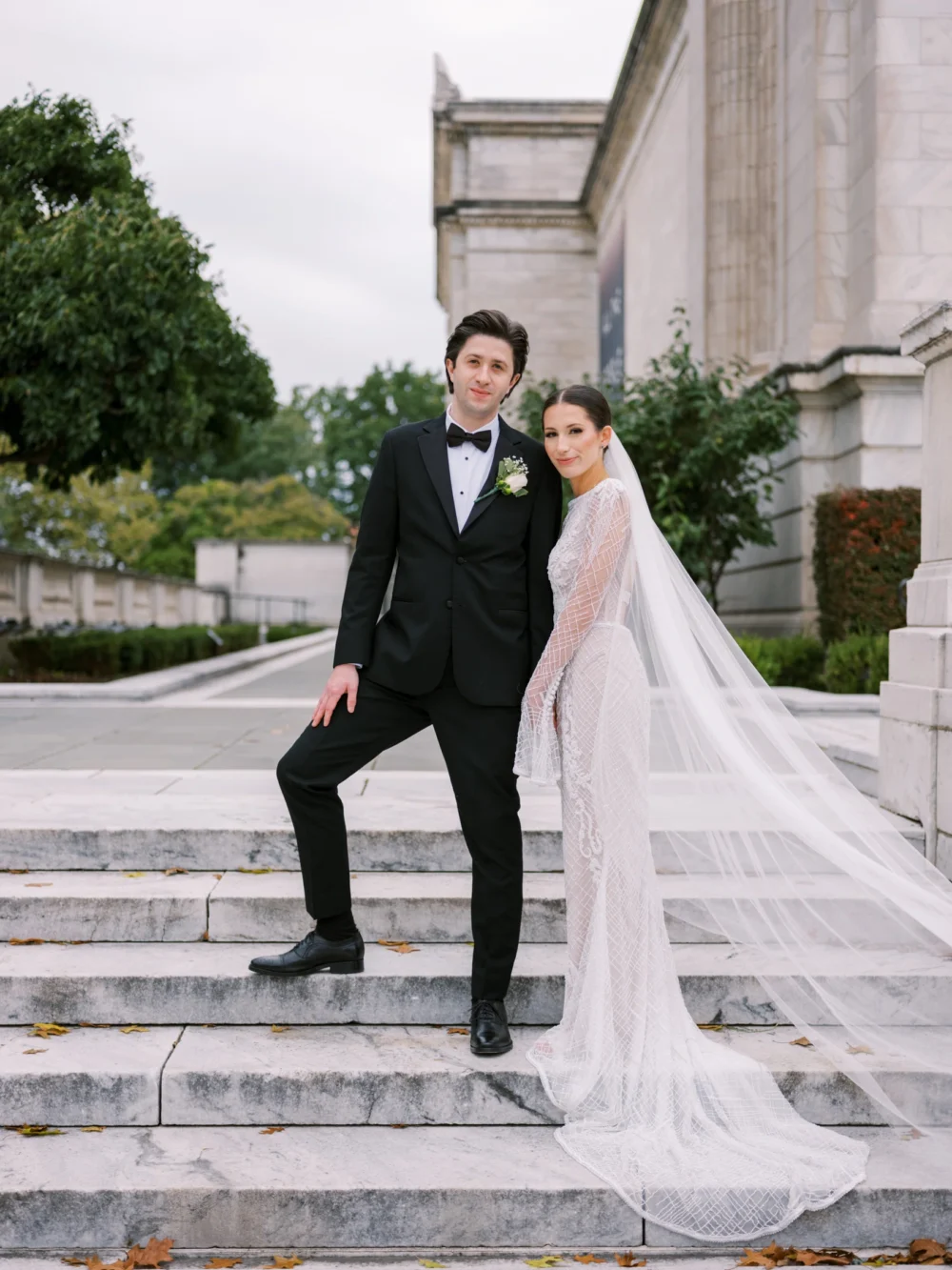 Bride wearing J. Andreatta gown, portrait with her groom at the Cleveland Art Museum for their dream wedding