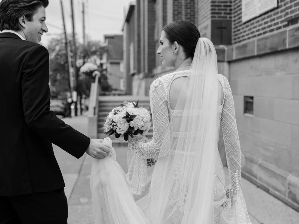 Bride wearing J. Andreatta gown after her wedding ceremony in Little Italy, Ohio