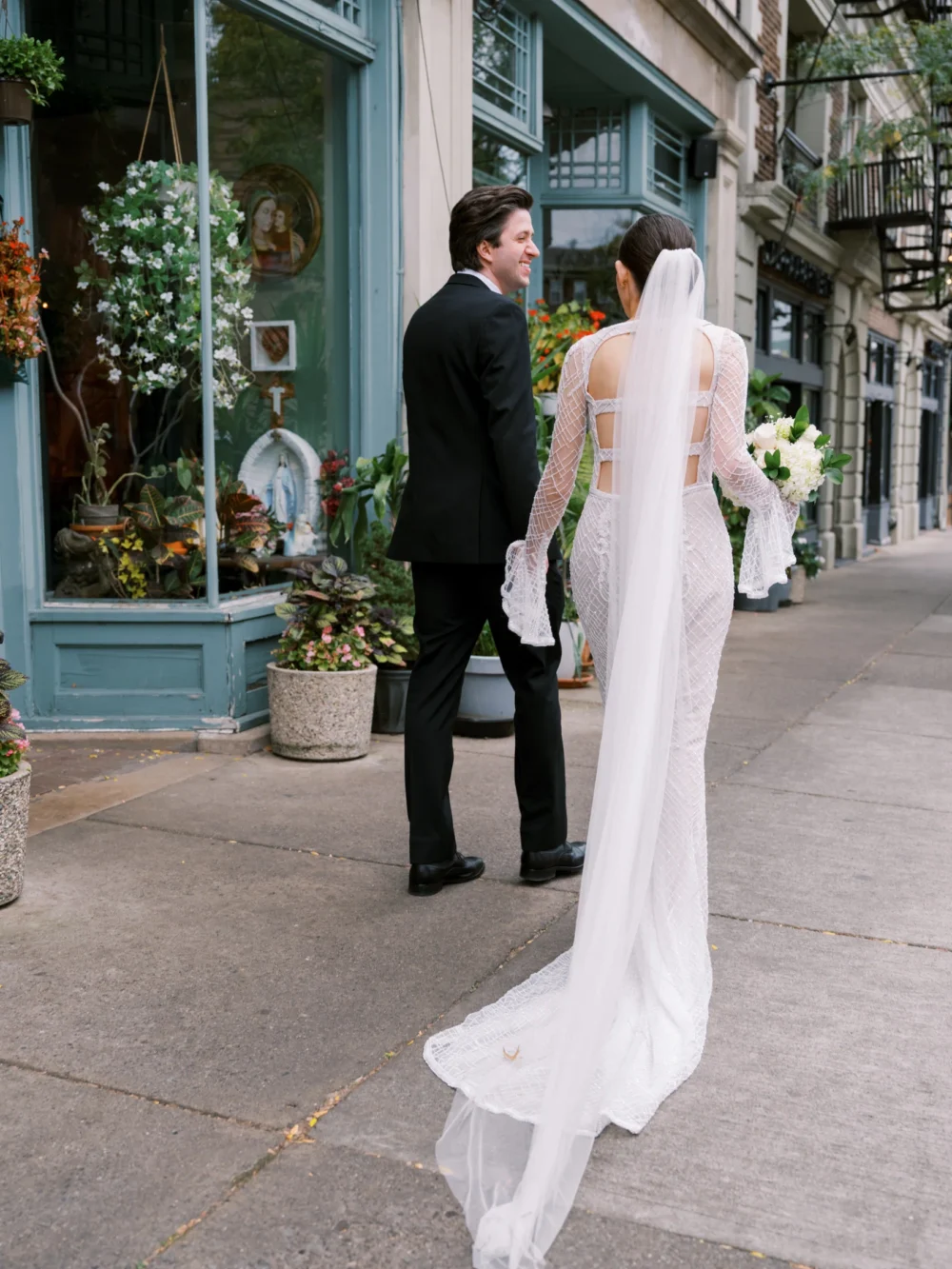 Bride wearing J. Andreatta gown after her wedding ceremony in Little Italy, Ohio