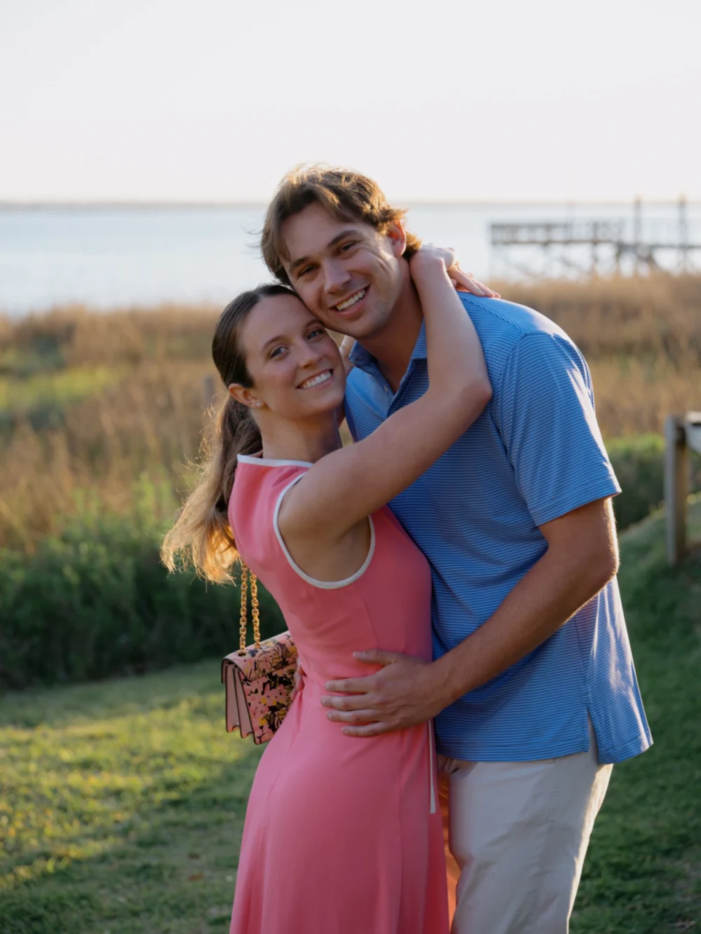 couple embracing after proposal in Charleston