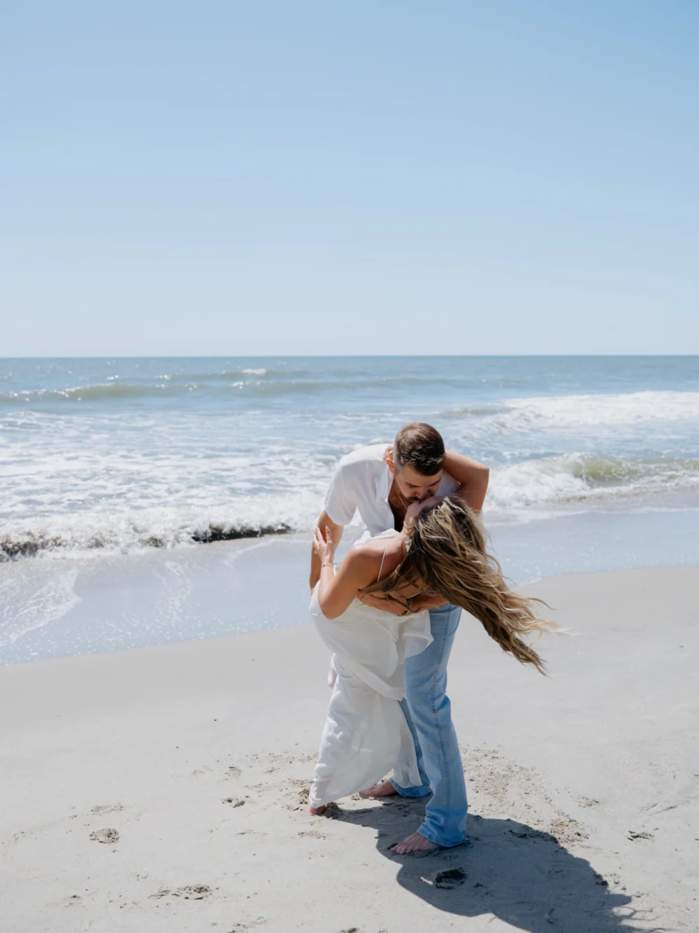 Charleston beach engagement photos at Isle of Palms