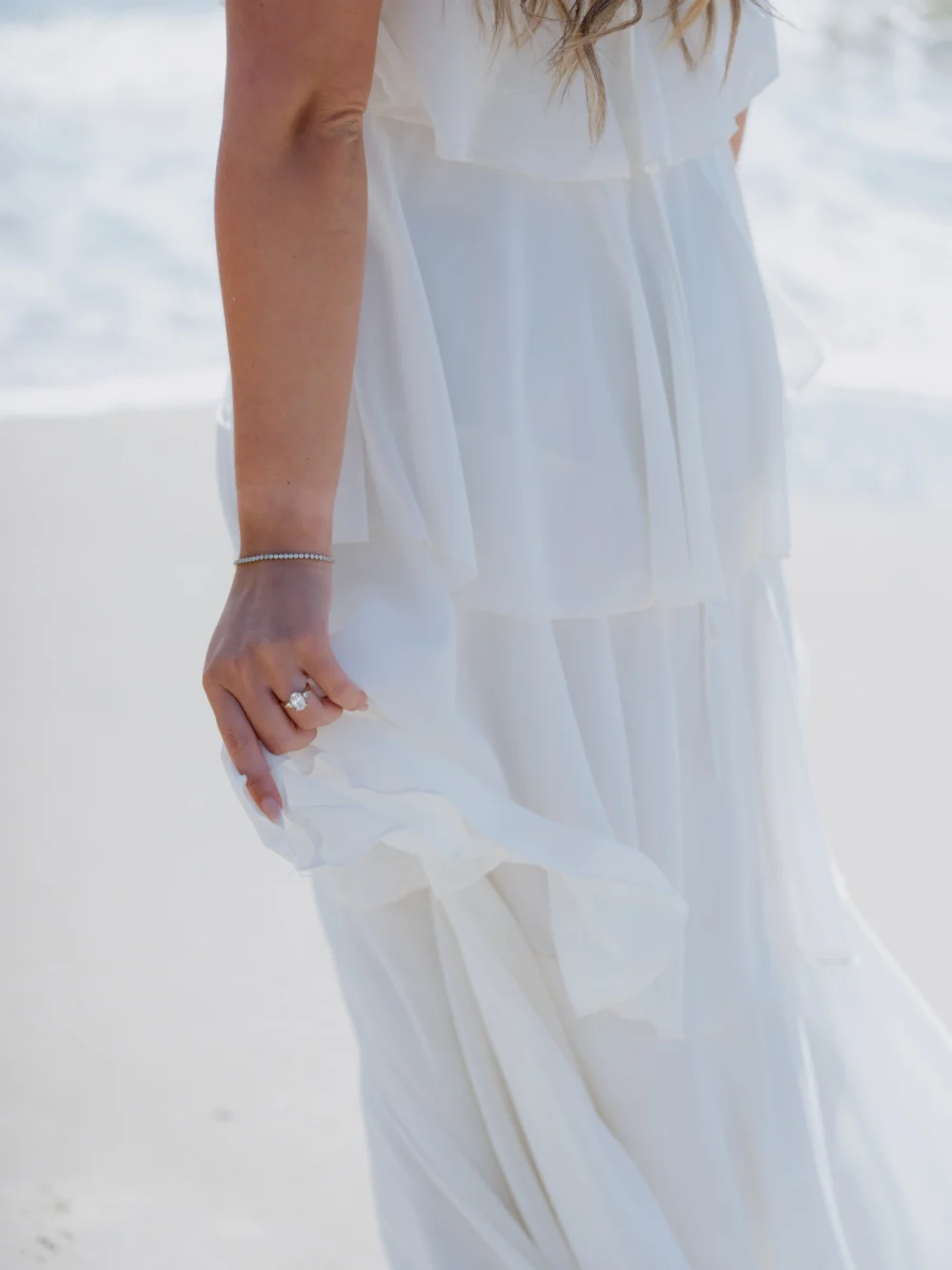 Flowy dress during beach engagement session in Charleston SC