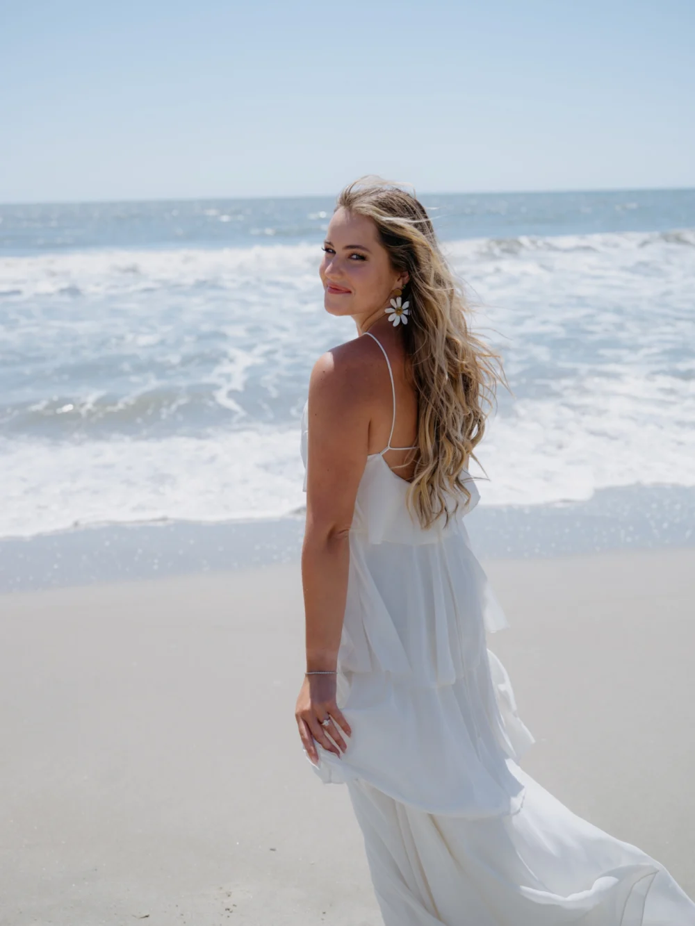 Flowy dress during beach engagement session in Charleston SC
