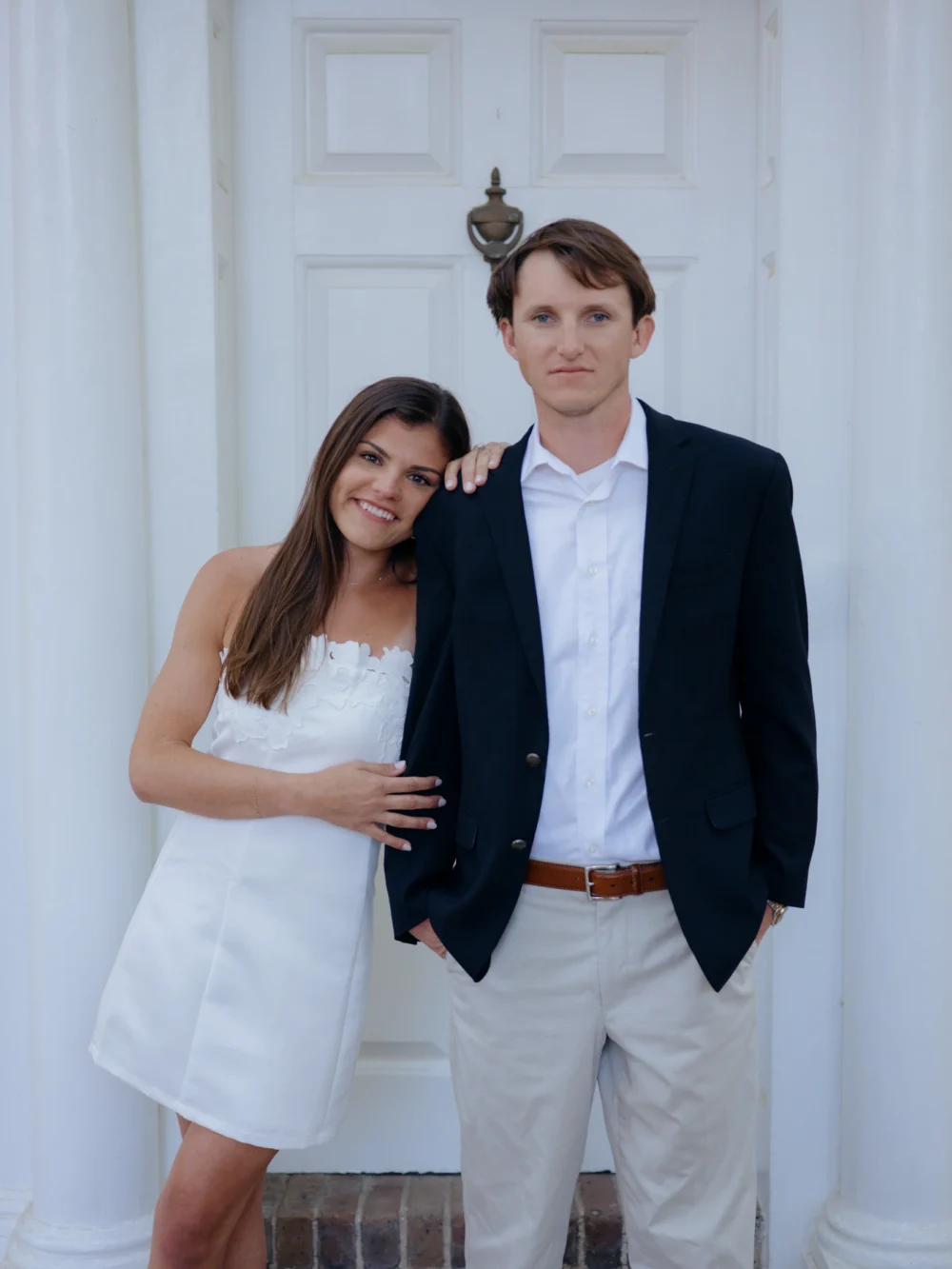 Engagement portraits near historic homes in downtown Charleston