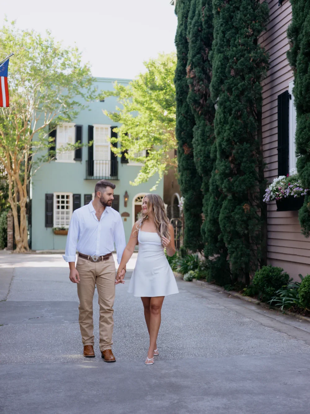 Couple walking through historic Downtown Charleston