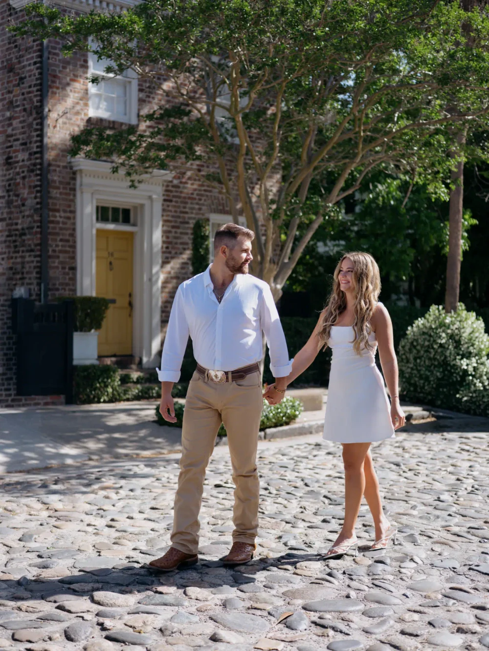 Couple walking through historic Downtown Charleston