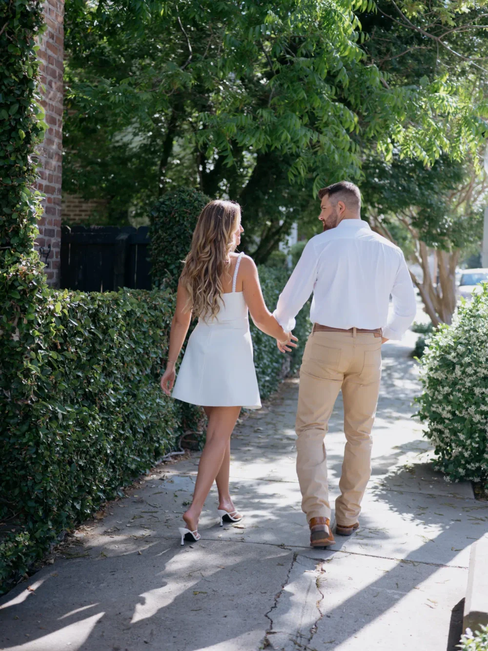 Couple walking through historic Downtown Charleston