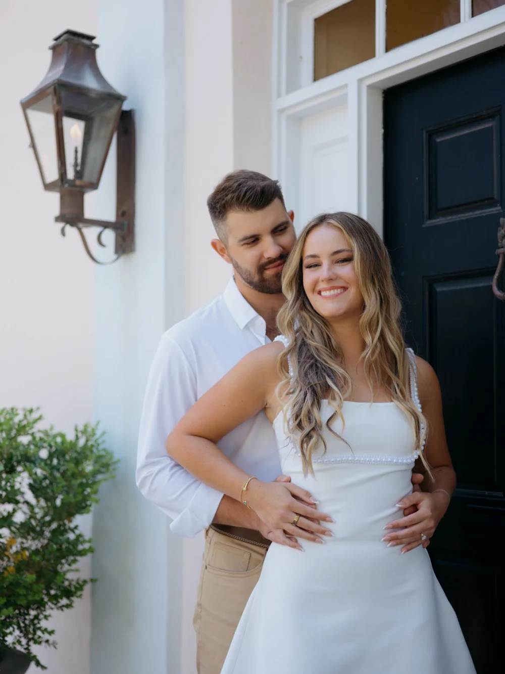 Couple embracing in Downtown Charleston historic district