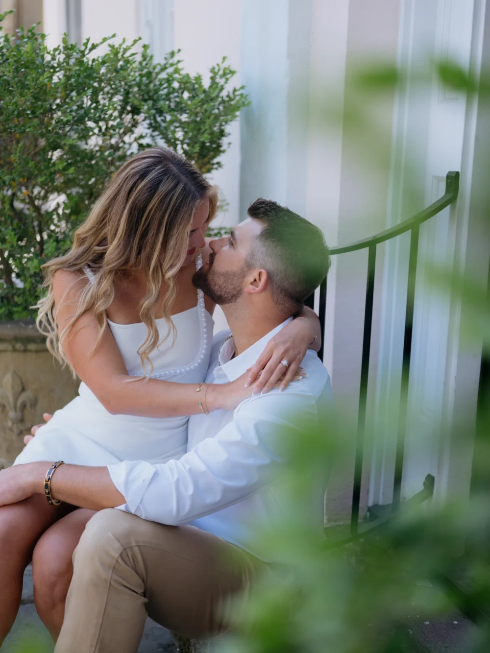 Couple embracing in Downtown Charleston historic district