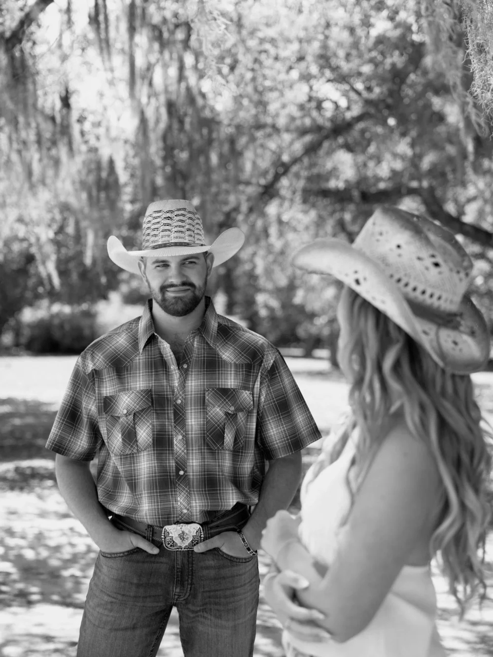 Romantic engagement photos under Spanish moss in Charleston