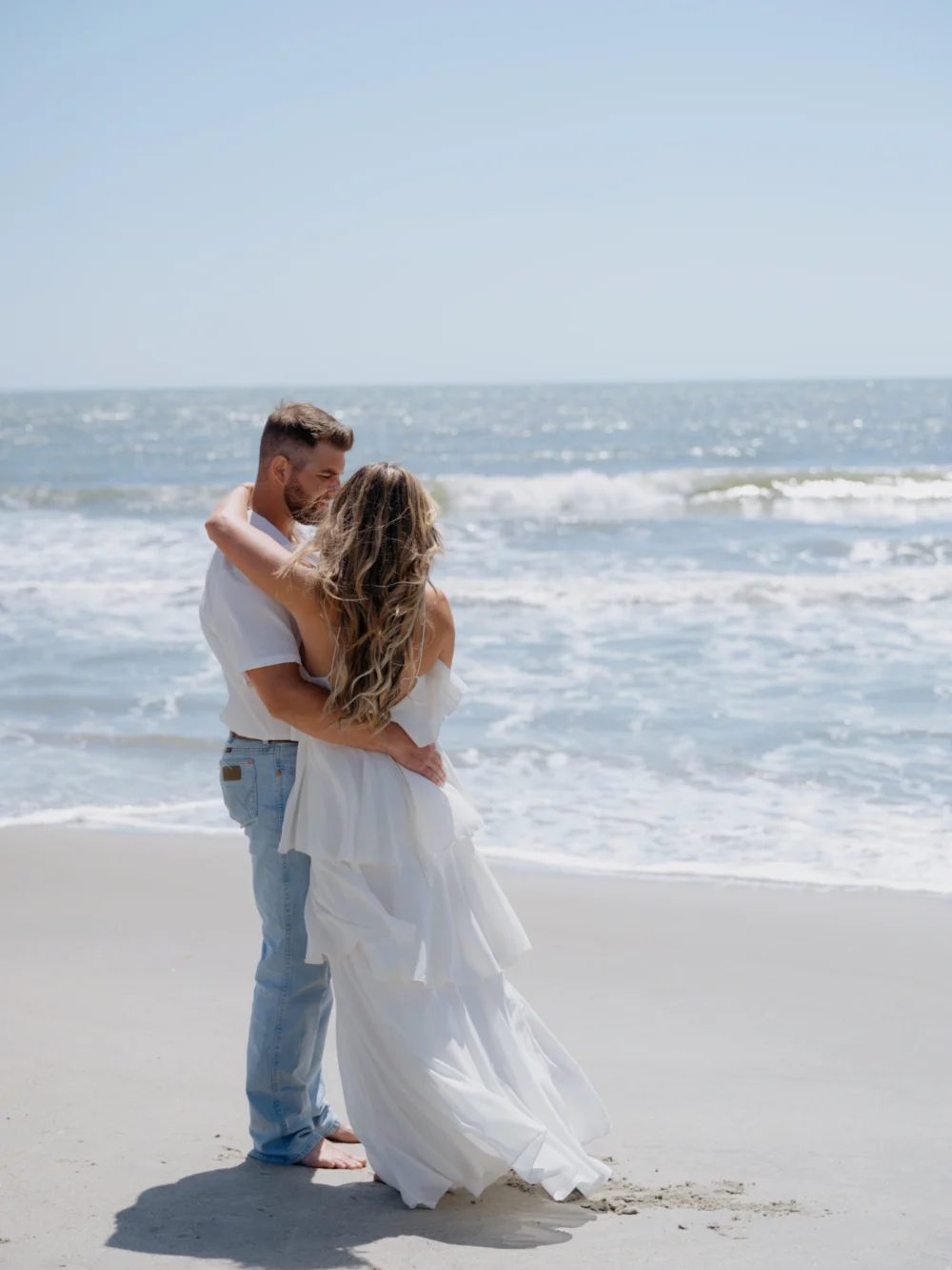Charleston SC beach engagement photographer capturing candid moments