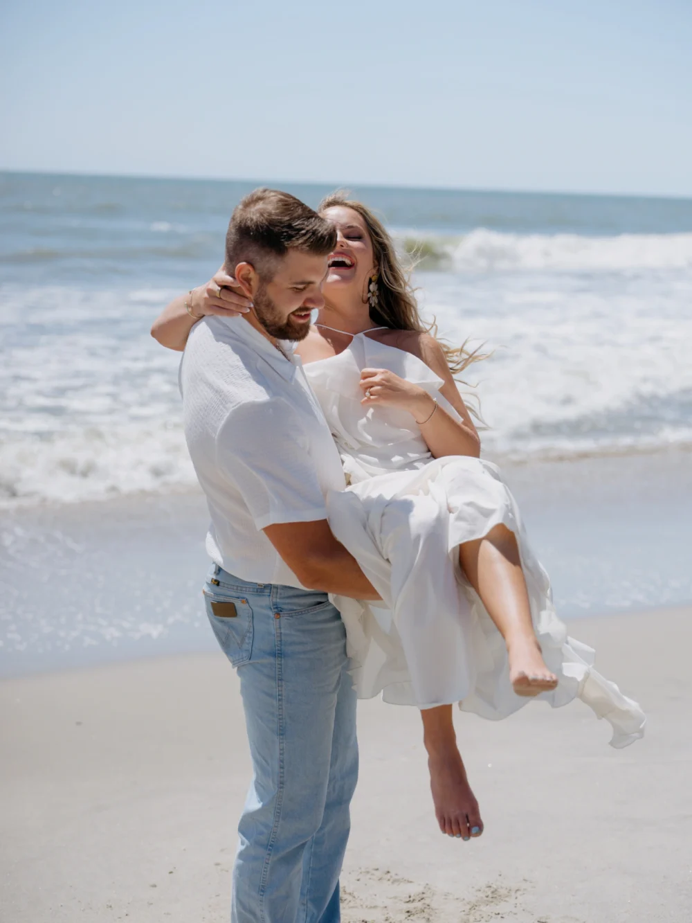Charleston SC beach engagement photographer capturing candid moments